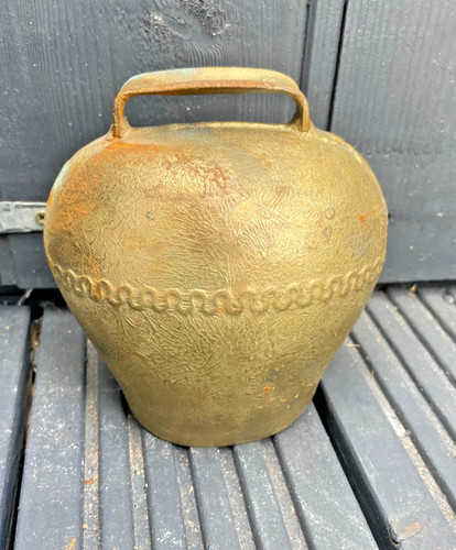 Metal cow bell possibly - cow,